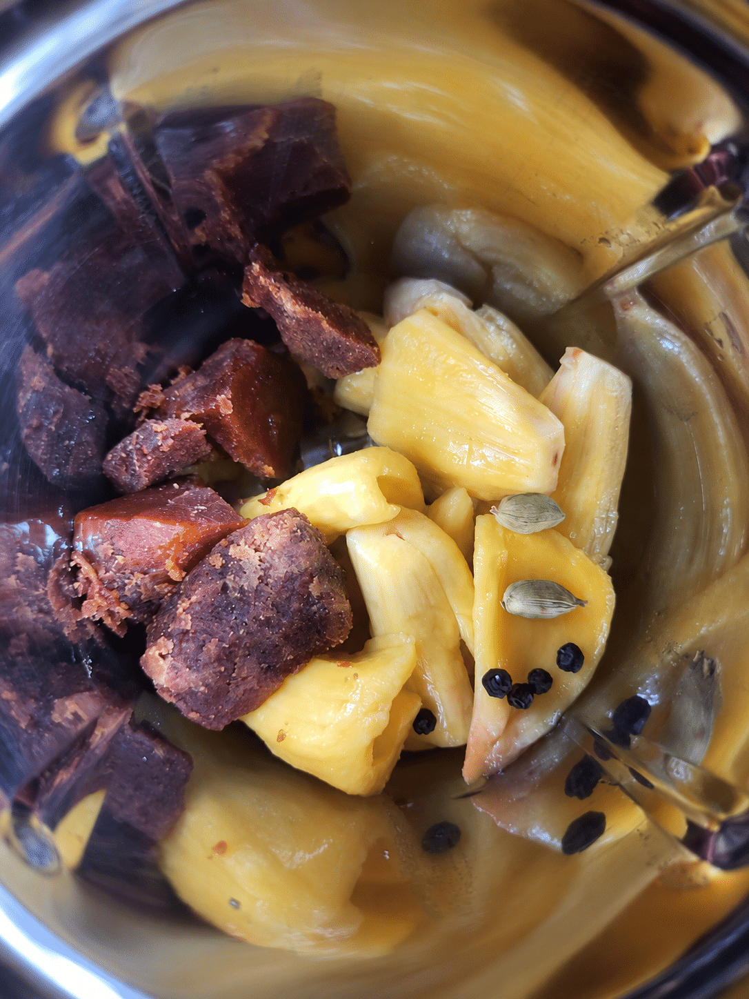 Jackfruit, jaggery, cardamom and pepper in the mixer jar