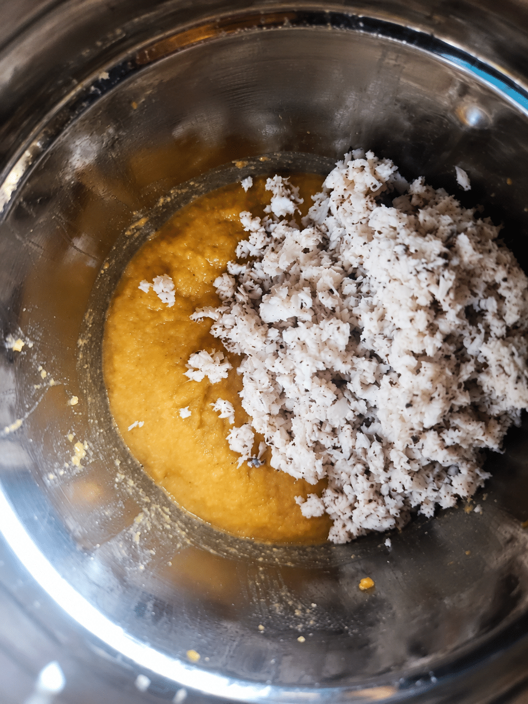 Fresh grated coconut added to the Garige mixture