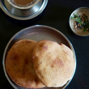 Golden Mangalore buns served with chutney and a cup of chai