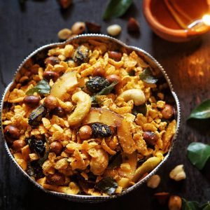 Poha chivda with peanuts, cashews, raisins, coconut and curry leaves