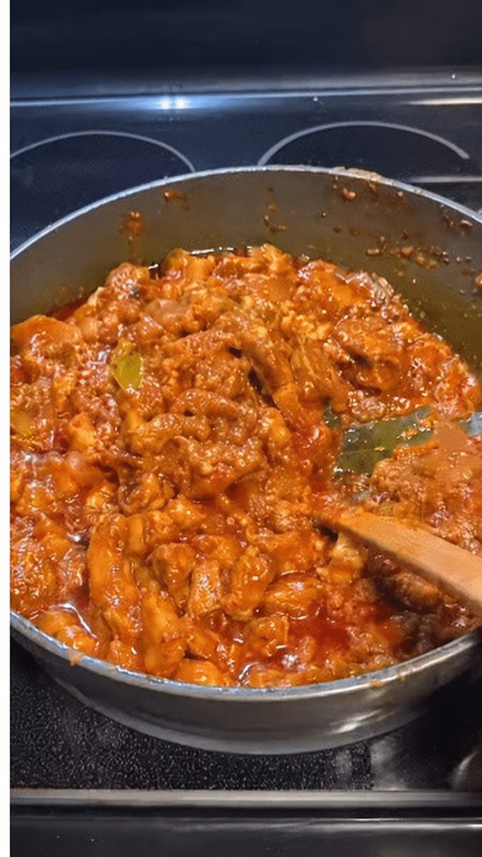 Pork Indad with its rich red masala in a cooking pan